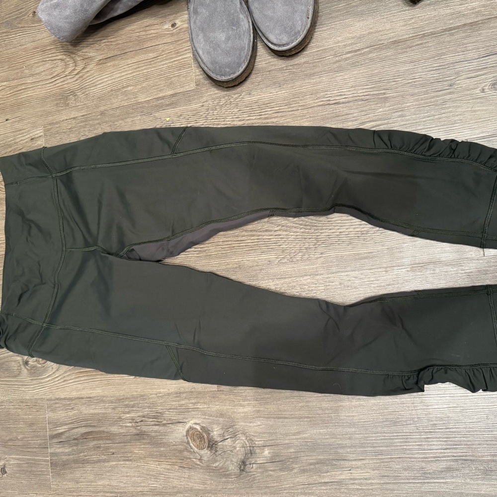 Army green lululemon leggings. Ruffles on bottom. Size 6